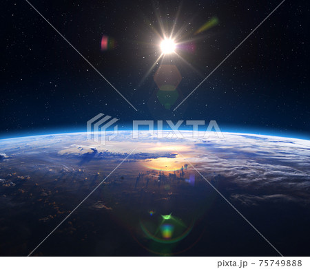 Earth and Sun. Sunrise, view of earth from space. 75749888
