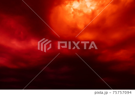 Fantastic concept mystical horror background from another planet from the paranormal world, fantasy style. Dramatic red black orange sky with scary hellish clouds and terrible shadows and light 75757094