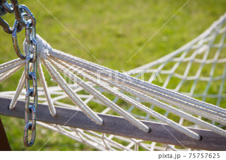 Grid rope as part of hammock. Vacation and summer time 75757625