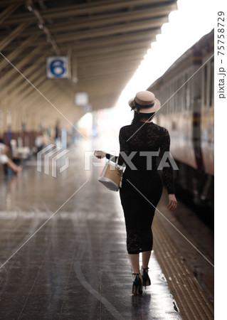 LGBT Transgender model travels on train at station railway LGBT Transgender model travels on train at station railway 75758729