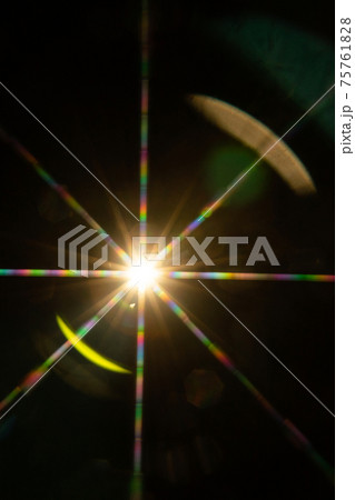 Abstract sun flare. The lens flare is subject to digital correction 75761828
