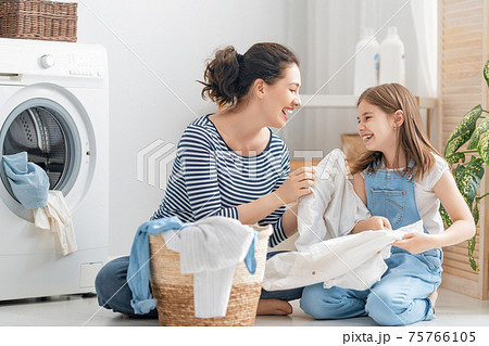 family doing laundry family doing laundry 75766105