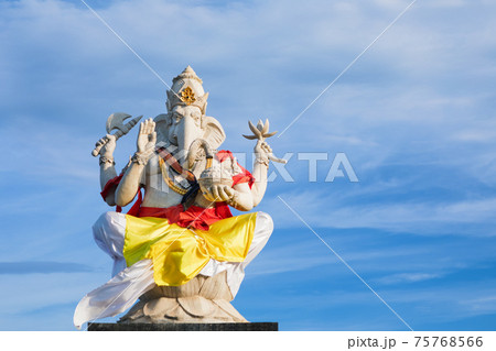 Ganesha sitting in meditating yoga pose  75768566