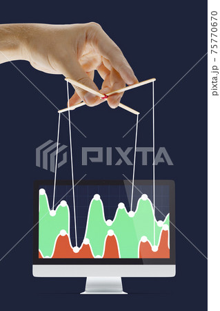 Businessman keeping the growth in economy, manipulating graphs like puppet 75770670