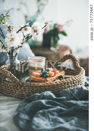 Waffles with blood orange and blueberries, rose 75770867