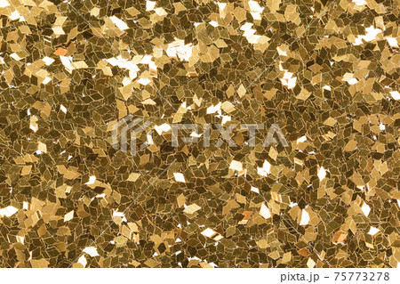 Perfect glitter background in shiny gold tone, luxury texture for expensive design. 75773278