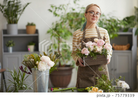 Portrait of Florist in Flower Shop 75779339