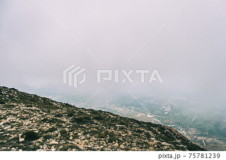 cloudy day with fog in the mountains of the natural park of the ports, in tarragona (spain) cloudy day with fog in the mountains of the natural park of the ports, in tarragona (spain) 75781239