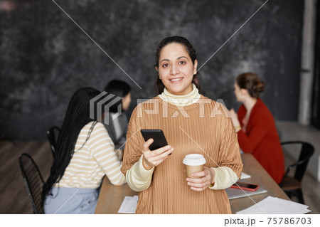 Portrait of Middle-Eastern Businesswoman in Meeting 75786703