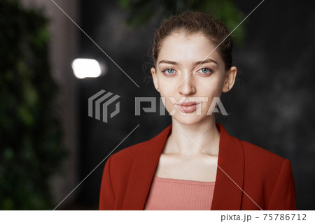Portrait of Elegant Businesswoman Wearing Red Portrait of Elegant Businesswoman Wearing Red 75786712