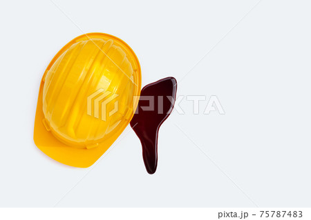 Construction helmet with blood on white background. 75787483