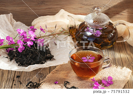 Herbal tea made from fireweed known as blooming sally in teapot and cup 75791532