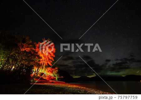 Starry night sky from Fitzroy Island beach, Queensland, Australia 75797759
