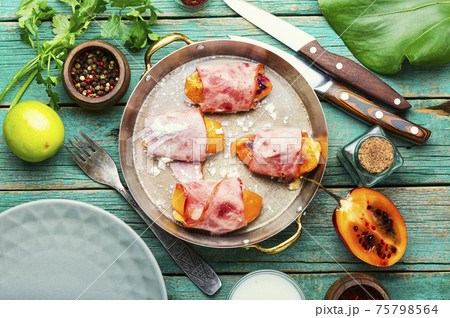 Stuffed bacon with tamarillo Stuffed bacon with tamarillo 75798564
