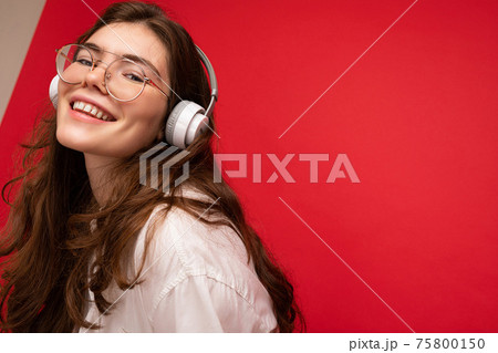 Closeup photo of sexy attractive positive smiling young brunet woman wearing white shirt and optical Closeup photo of sexy attractive positive smiling young brunet woman wearing white shirt and optical 75800150