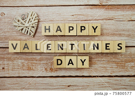 Happy Valentines day alphabet letter on wooden background 75800577