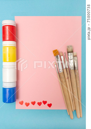 Flat layout with clipboard mockup. Acrylic paints and brushes on a colored background. Advertising banner. Flat layout with clipboard mockup. Acrylic paints and brushes on a colored background. Advertising banner. 75800738