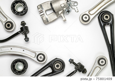 Car inspection. Auto motor mechanic spare or automotive piece on white background. Set of new metal car part. Repair and vehicle service with space for text. Car inspection. Auto motor mechanic spare or automotive piece on white background. Set of new metal car part. Repair and vehicle service with space for text. 75801409
