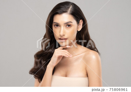 Beautiful Glamour indian woman touch chin smile with clean and fresh skin Happiness and cheerful with positive emotional,isolated on grey background,Beauty Cosmetics and spa Facial treatment Concept Beautiful Glamour indian woman touch chin smile with clean and fresh skin Happiness and cheerful with positive emotional,isolated on grey background,Beauty Cosmetics and spa Facial treatment Concept 75806961