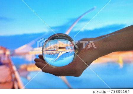 A Glass Lens ball and The Samuel Beckett Bridge A Glass Lens ball and The Samuel Beckett Bridge 75809164