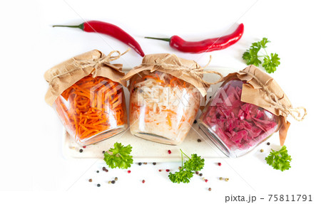 Healthy fermented homemade jar vegetables on isolated background Healthy fermented homemade jar vegetables on isolated background 75811791