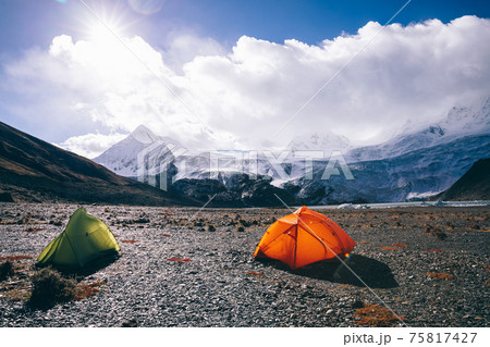 Camping facing beautiful glacier mountains in tibet,China Camping facing beautiful glacier mountains in tibet,China 75817427