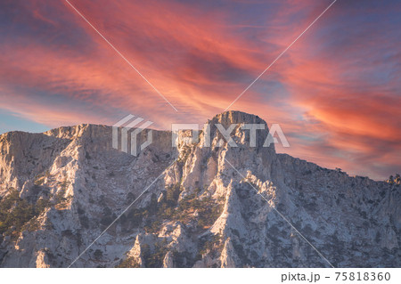 A majestic view of the rocky mountains ranges in beautiful pink sunset 75818360