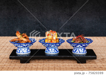 Thai fried snack fried tofu fried pork in ceramic bowls Thai fried snack fried tofu fried pork in ceramic bowls 75820399