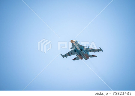 Russia, Khabarovsk - May 9, 2020: Su-34 front-line fighter-bomber . Parade in honor of victory. Military air parade in honor of Victory Day.  75823435