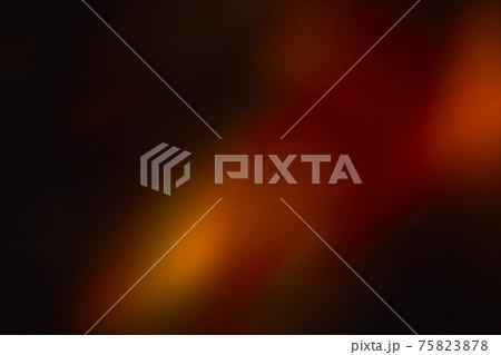 colorful warm rainbow light leaks on black background with dust texture 75823878
