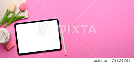 Pink creative flat lay workspace with digital tablet, supplies, tulip flowers and copy space Pink creative flat lay workspace with digital tablet, supplies, tulip flowers and copy space 75824732