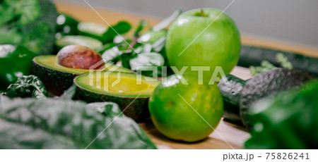 Healthy food clean eating selection: fruit, vegetable, seeds, superfood, leaf vegetable and 75826241