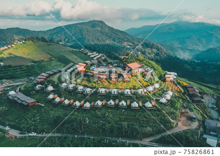 Aerial view of camping grounds and tents on Doi Mon Cham mountain in Mae Rim, Chiang Mai province Aerial view of camping grounds and tents on Doi Mon Cham mountain in Mae Rim, Chiang Mai province 75826861