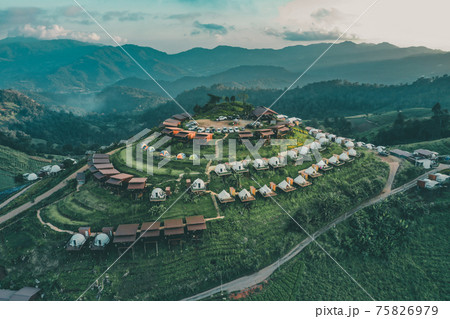 Aerial view of camping grounds and tents on Doi Mon Cham mountain in Mae Rim, Chiang Mai province Aerial view of camping grounds and tents on Doi Mon Cham mountain in Mae Rim, Chiang Mai province 75826979