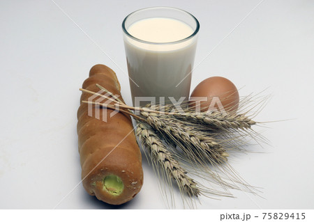 tasty and healthy cream roll with milk and egg and wheat 75829415