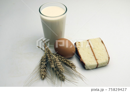 tasty and healthy cake with milk and egg and wheat and Atta 75829427