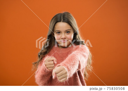 Girl hold fists ready attack or defend. Girl child cute but Girl hold fists ready attack or defend. Girl child cute but 75830508