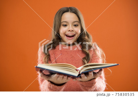 Child enjoy reading book. Book store concept. Wonderful  75830535