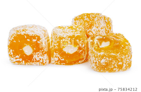Yellow Turkish Delight sweets isolated on white Yellow Turkish Delight sweets isolated on white 75834212