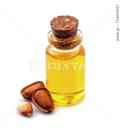 Cedar oil on white backgrounds. 75834947