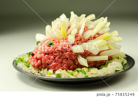 Traditional German dish called Mettigel,.Mett served as a Mett hedgehog 75835249
