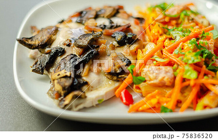Chicken breast with sliced mushrooms, ham, in cheese sauce with pasta salad Chicken breast with sliced mushrooms, ham, in cheese sauce with pasta salad 75836520