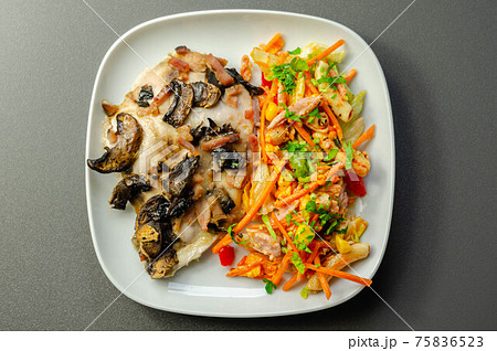 Chicken breast with sliced mushrooms, ham, in cheese sauce with pasta salad Chicken breast with sliced mushrooms, ham, in cheese sauce with pasta salad 75836523