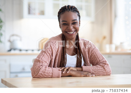 Portrait Of Happy Millennial Black Lady Posing In Kitchen, Smiling At Camera Portrait Of Happy Millennial Black Lady Posing In Kitchen, Smiling At Camera 75837434