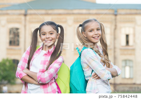 Kids going to school schoolgirls with backpacks, fancy girls concept Kids going to school schoolgirls with backpacks, fancy girls concept 75842448