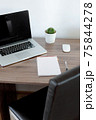 Office at home. LaptOffice at home. Laptop. notebook. pen are on the table.op. notebook. pen are on the table. 75844278