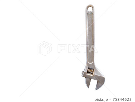 Old metal adjustable wrench isolated on white background. Old metal adjustable wrench isolated on white background. 75844622
