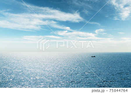 Lonely fishing ship trawler boat on ocean 75844764