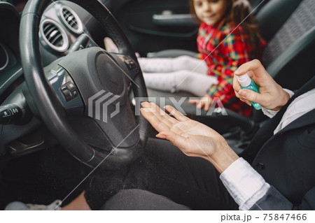 Cute mother and her daughter are traveling by car Cute mother and her daughter are traveling by car 75847466