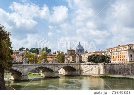 San Pietro basilica and Sant angelo bridge in Rome San Pietro basilica and Sant angelo bridge in Rome 75849833